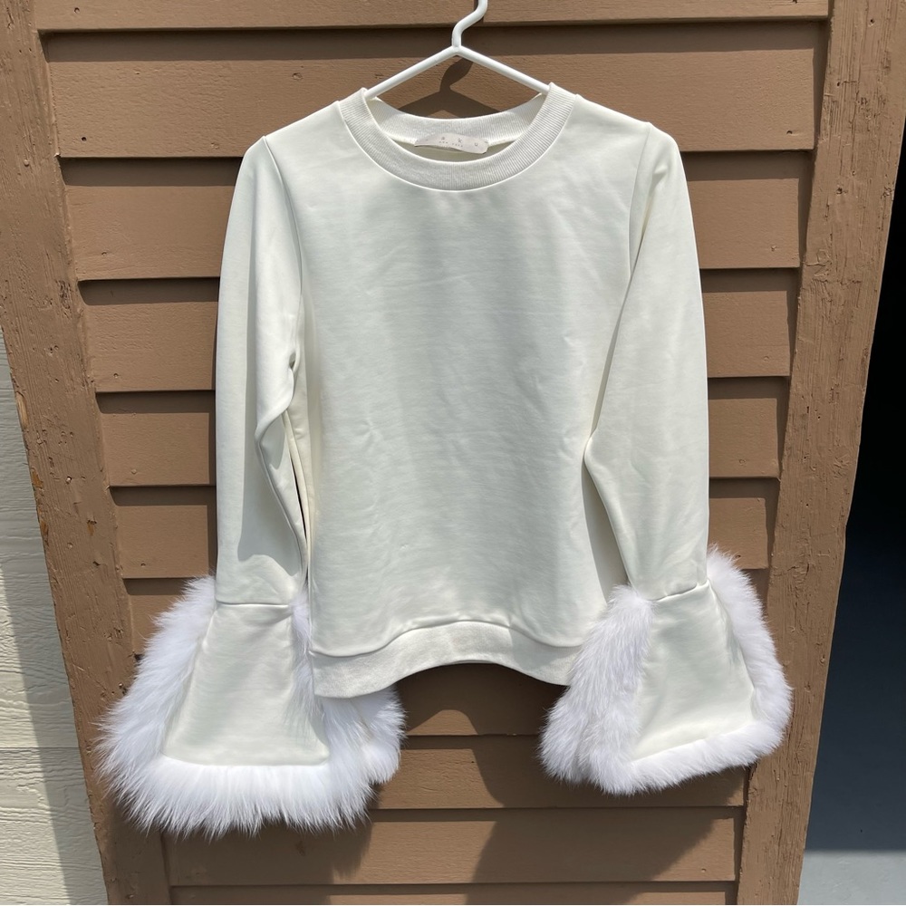 Saku sweater with fox fur detail. Size small.